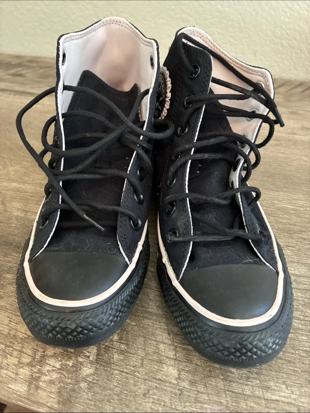 Converse Women’s Black High-Top Sneakers with Light Pink Bows